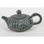 A Chinese bronze teapot in the form of a gourd, 4 character mark to base, 5" long