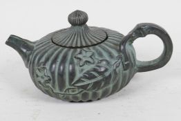 A Chinese bronze teapot in the form of a gourd, 4 character mark to base, 5" long