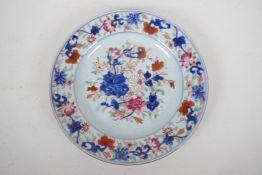 A late C18th/early C19th Chinese famille rose porcelain plate, painted with vases and flowers in