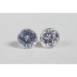 A pair of silver and cubic zirconium stud earrings