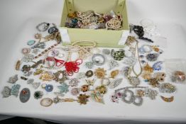 A box of good quality vintage costume jewellery