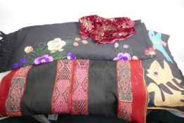 A collection of Indian and Asian textiles including embroidery (4)