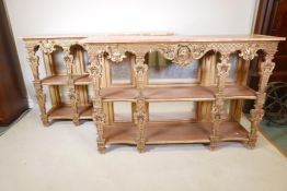 A pair of early C19th carved giltwood mirror backed console tables, with Sienna marble tops and