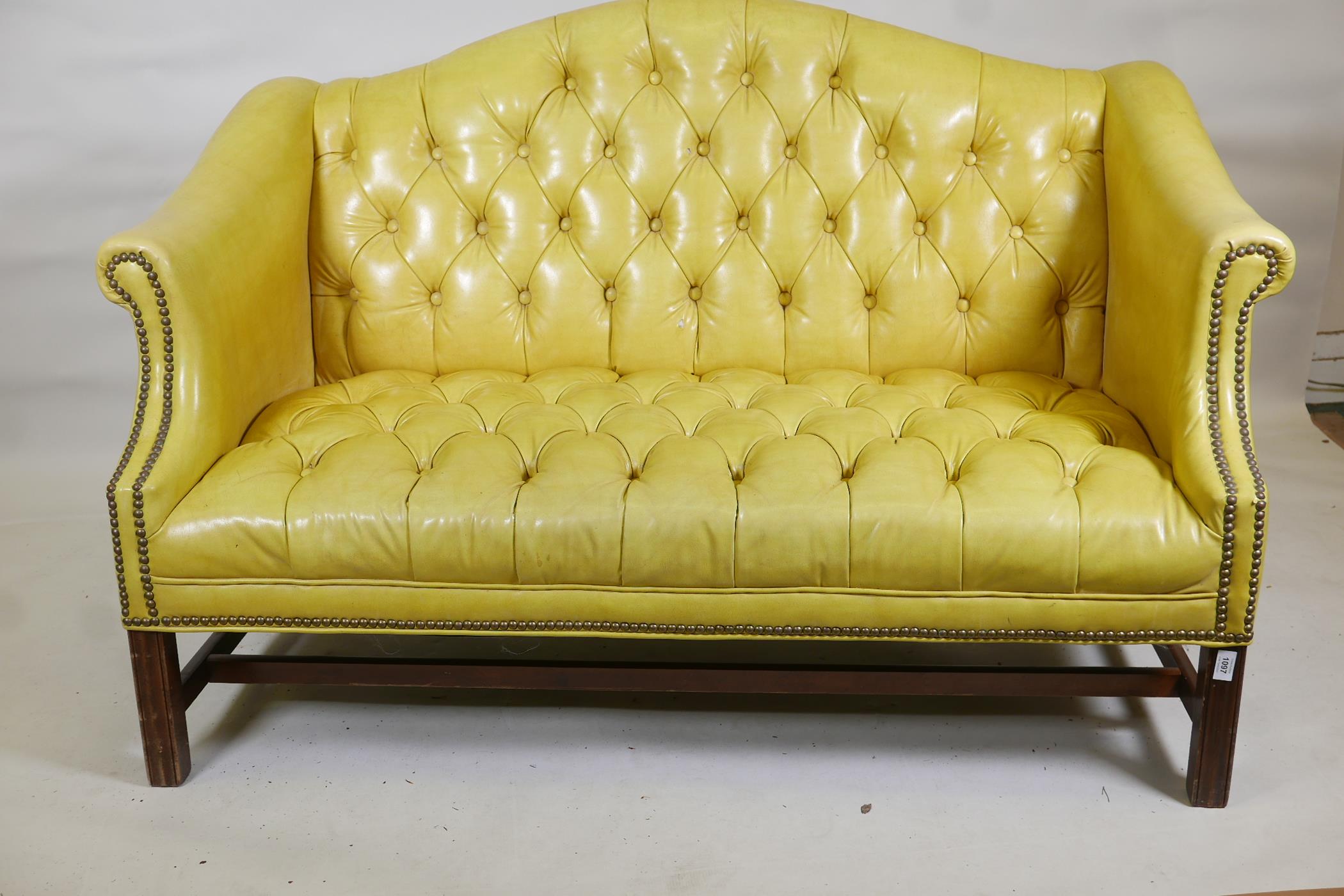A Chippendale style buttoned leatherette two seater settee with brass studs and carved back and - Image 2 of 2