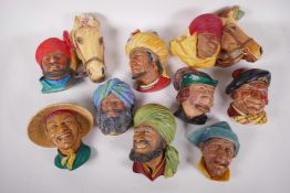 Ten Bossons plaster wall masks, two of turbaned gentlemen with horses, 9" x 8", Robin Hood, man in