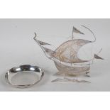 A silver filigree model of a sailing ship, 6½" long, and a small silver pin tray with engine