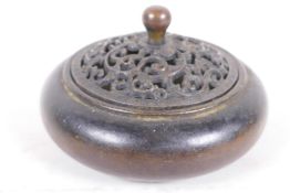 A Chinese bronze censer with pierced lid, 4" diameter