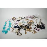 A quantity of costume jewellery including necklaces, bangles and rings