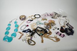 A quantity of costume jewellery including necklaces, bangles and rings
