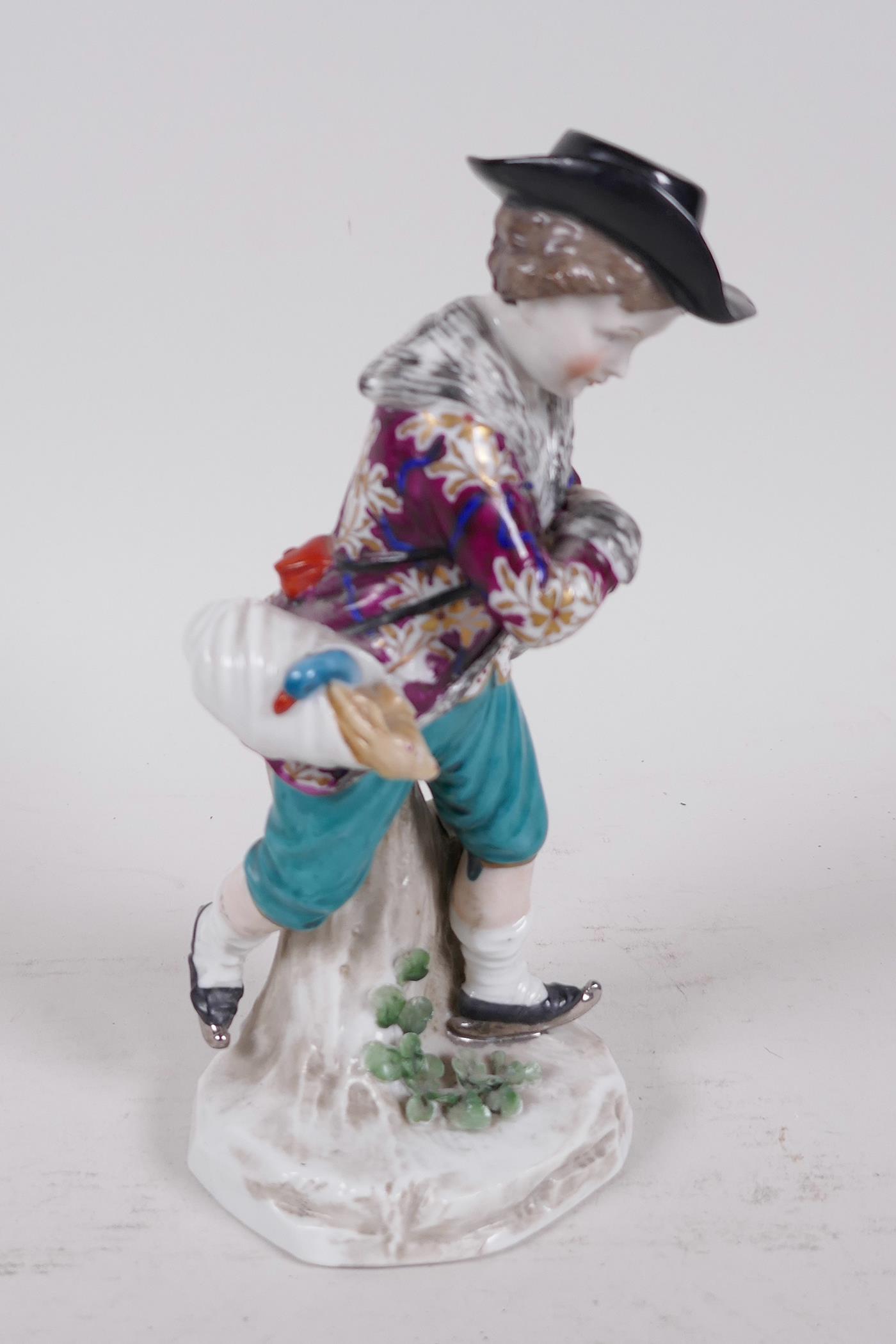 A Continental porcelain figure of a boy skater with a swag of game on his belt, anchor mark to base, - Image 2 of 5