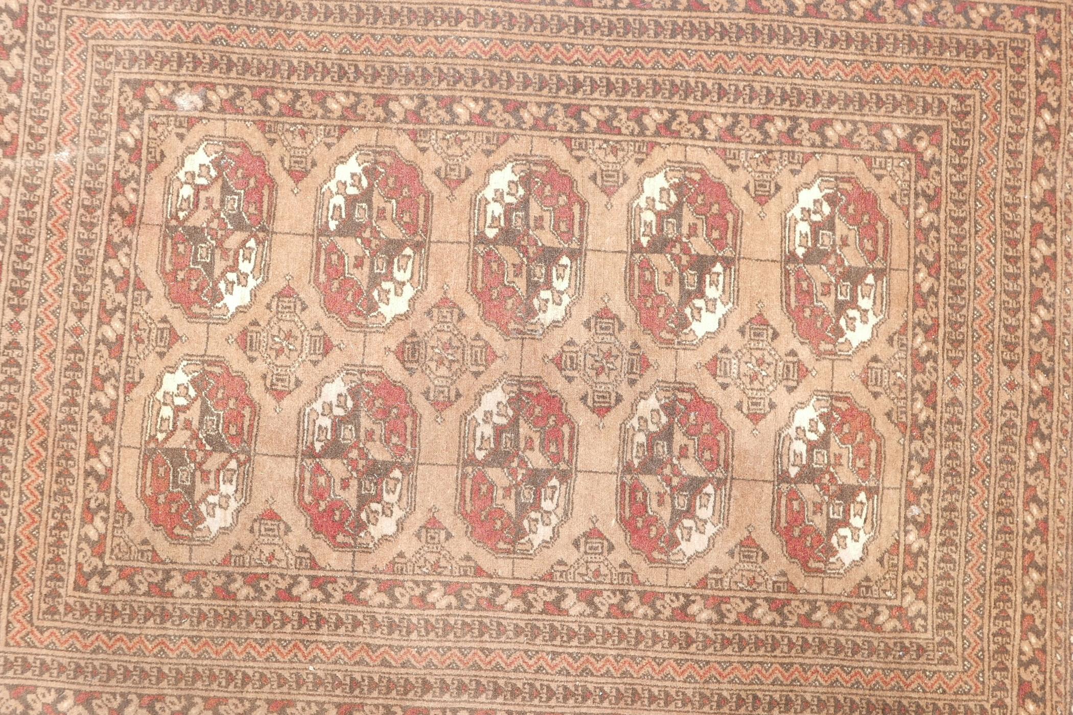 A brown ground Bokhara rug, 33½" x 53" - Image 2 of 4