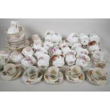 A quantity of pottery and porcelain teawares including a Royal Doulton tea service, Wilkinson five