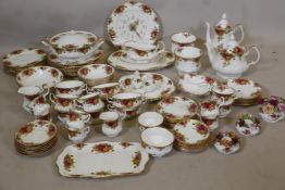 An extensive Royal Albert Old Country Rose dinner, tea and coffee service comprising eight place