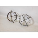 A pair of C19th/early C20th wrought iron game hooks, with conversions for electricity, 16½" diameter