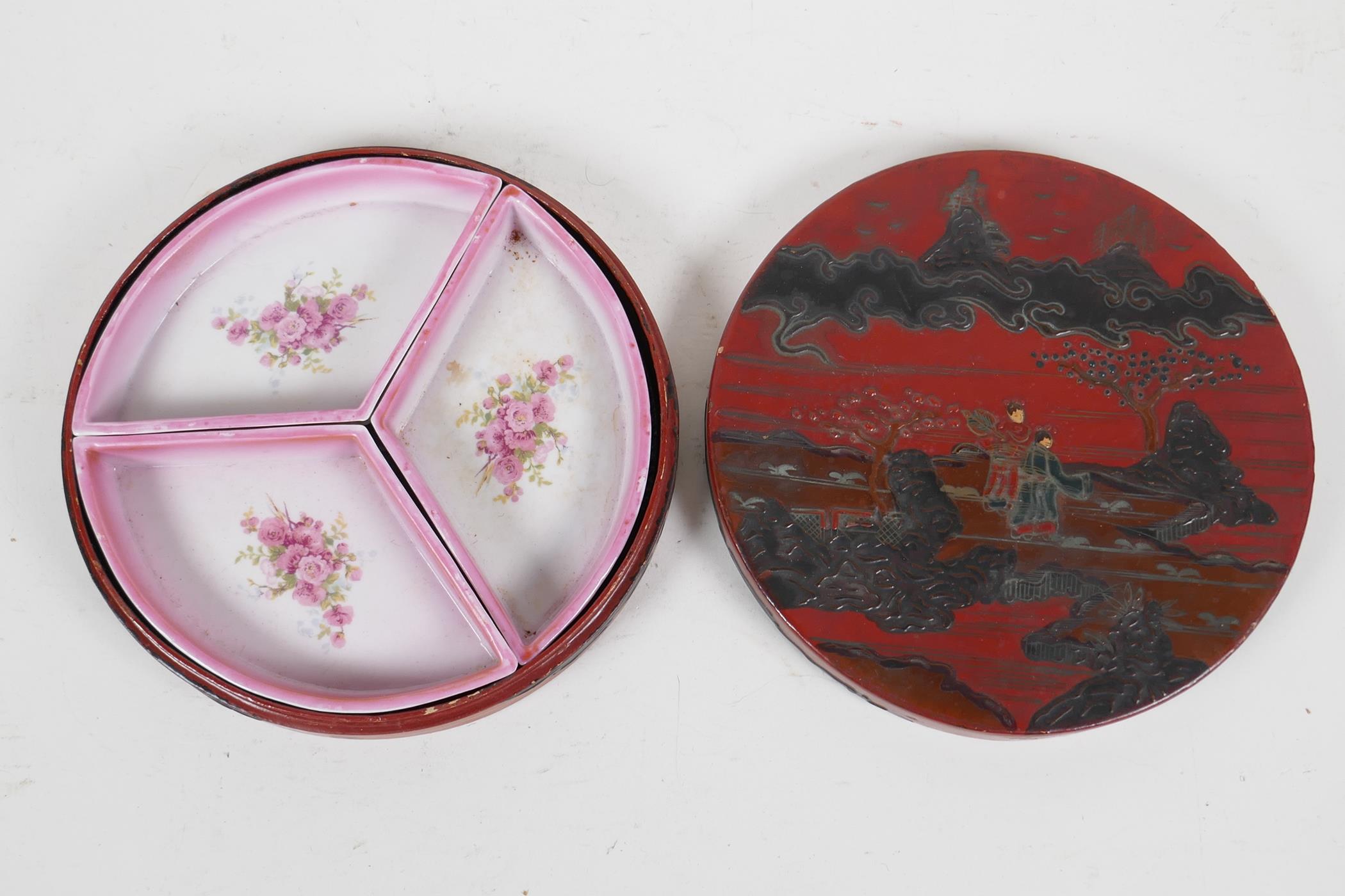 A Japanese red and black lacquer cylinder box decorated with figures in a landscape, the interior - Image 3 of 5