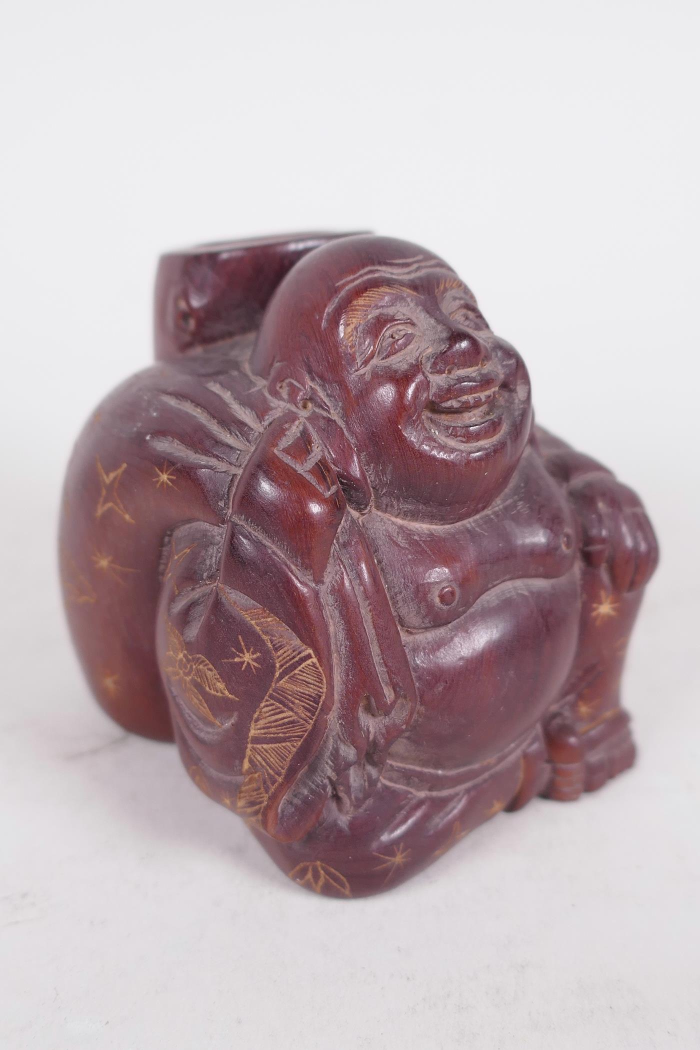 A Japanese carved hardwood figure of a traveller with large sack and tree stump on his back, 2½" - Image 2 of 5