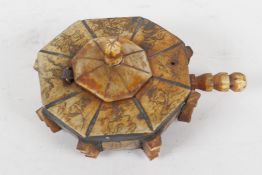 A vintage Chinese wood and bone snuff box of octagonal form carved with figures and symbols, A/F,