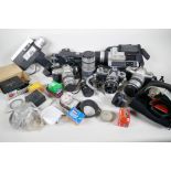 A quantity of 35mm SLR cameras, various cine-cameras, lenses etc, including Pentax MZ7, Pentax MZ-M,