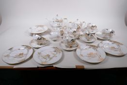 A Japanese Kutani six piece tea service with empress head lithophanes to the cups, comprising