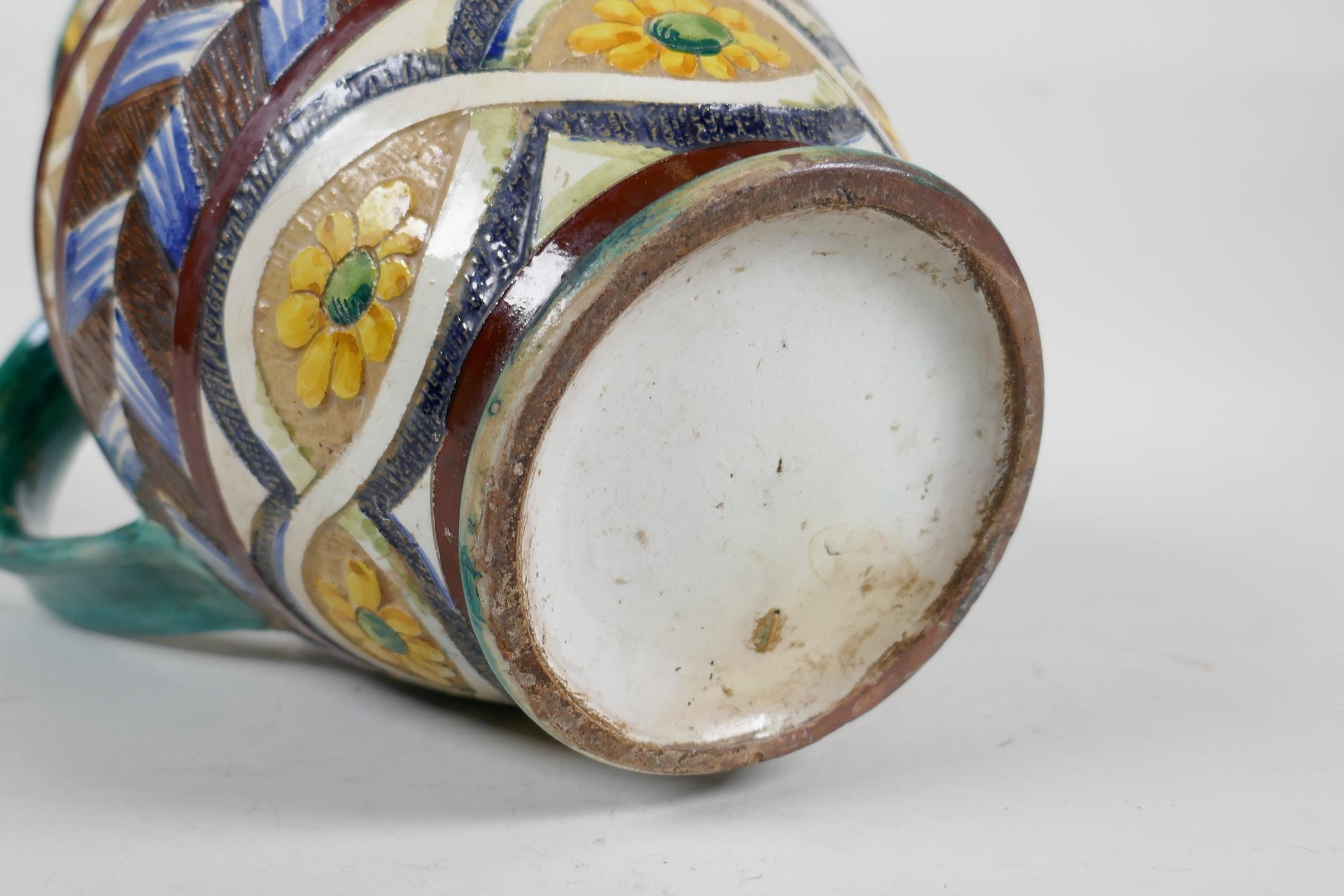 A majolica water jug with scrolling leaf and sunflower decoration, 10" high - Image 5 of 5