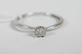 An 18ct white gold and diamond engagement ring, approximate size 'N'