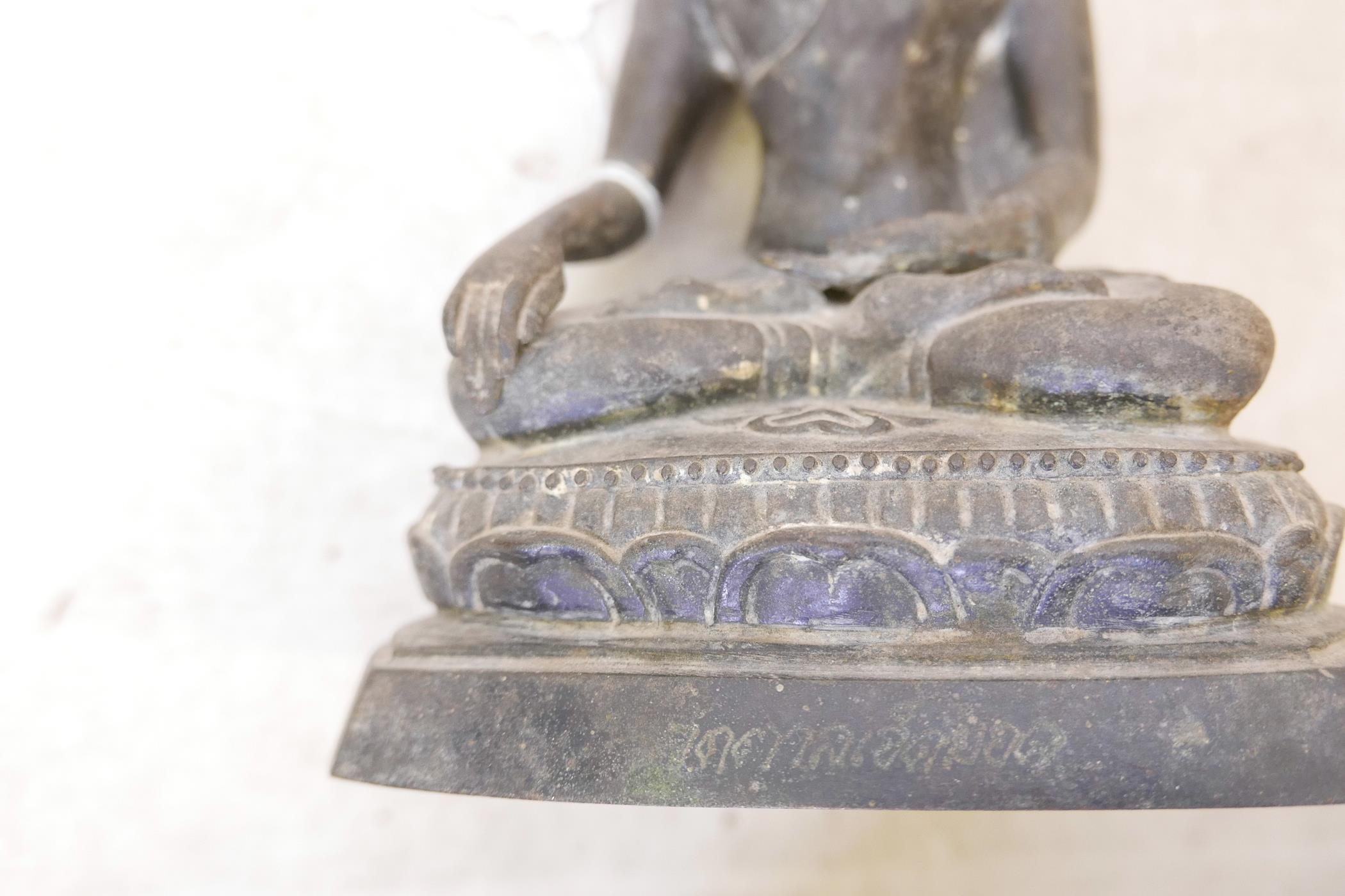 A C19th Siamese bronze Buddha, seated upon a lotus throne and inscribed to the base, 8" high - Image 5 of 5