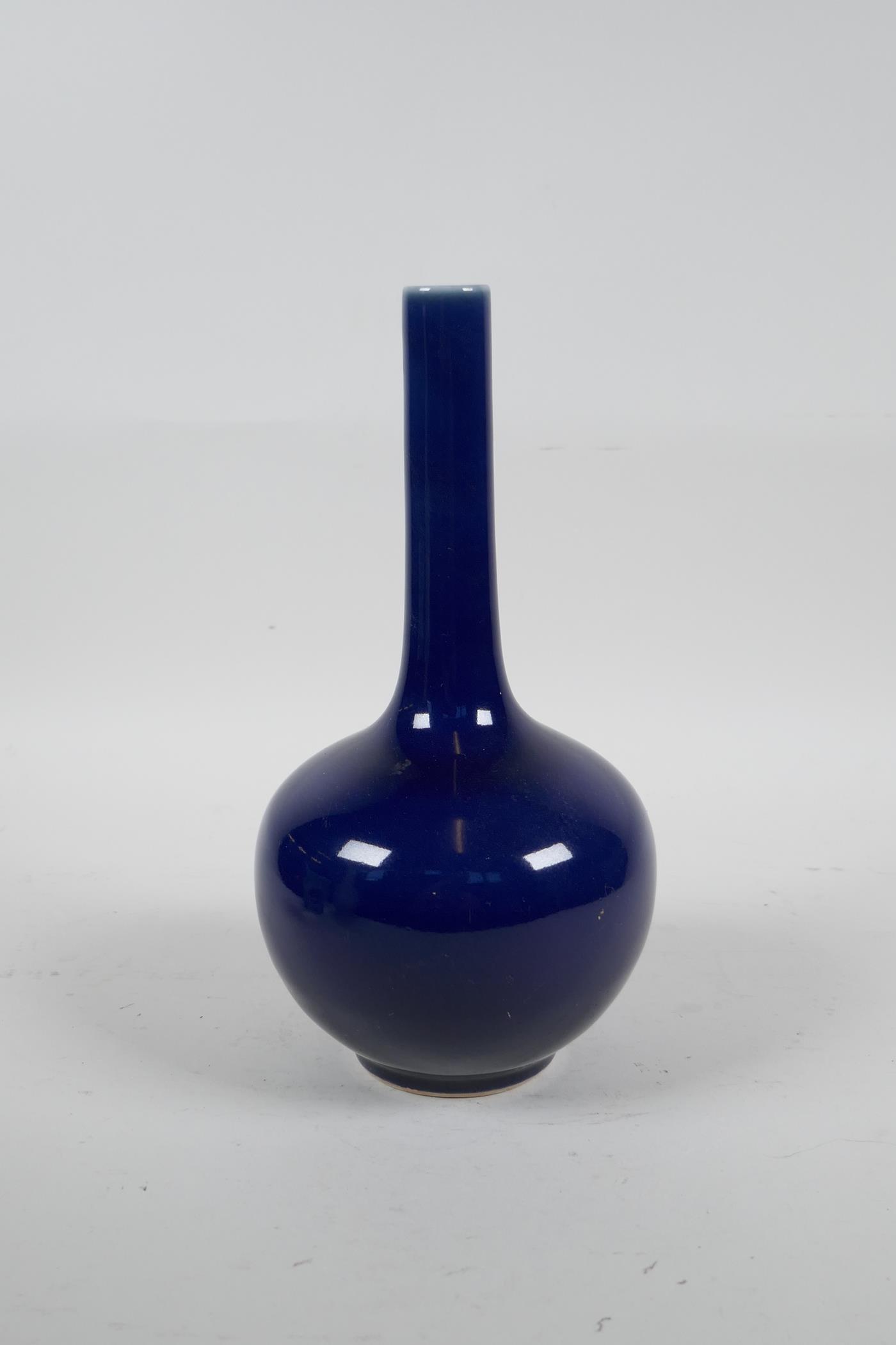 A Chinese powder blue glazed porcelain bottle vase with a slender neck, 8½" high - Image 2 of 3