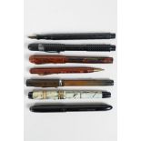A collection of early British fountain pens to include 'The Guinea', a 'Golden Guinea', an '