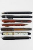 A collection of early British fountain pens to include 'The Guinea', a 'Golden Guinea', an '