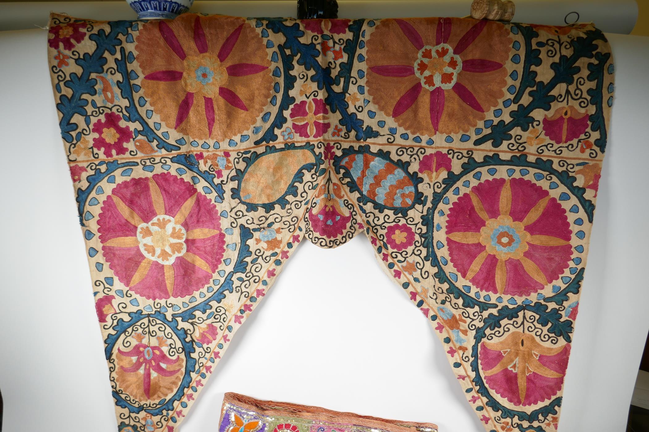 A Vintage Uzbekistan suzani embroidered door drape, an Indian pelmet, two Uzbekistan suzani cushions - Image 2 of 6