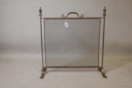 A Victorian bronze fire guard with scroll handle, 25" x 24"