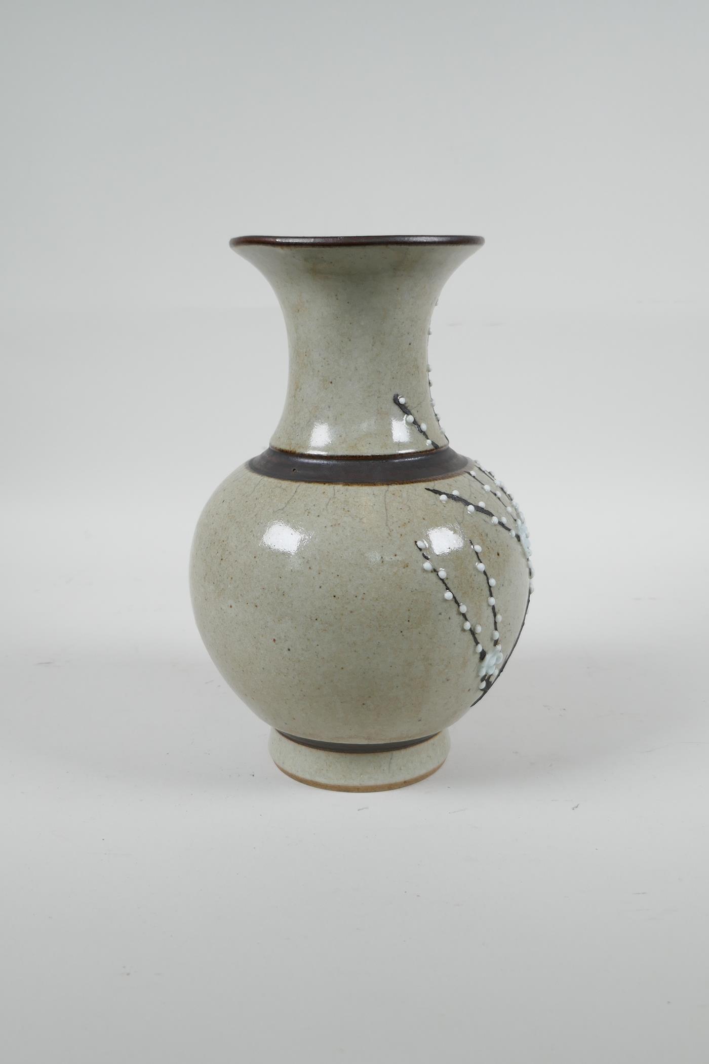 A Chinese beige ground pottery vase with bronze style bands and prunus blossom decoration, 8" high - Image 3 of 4