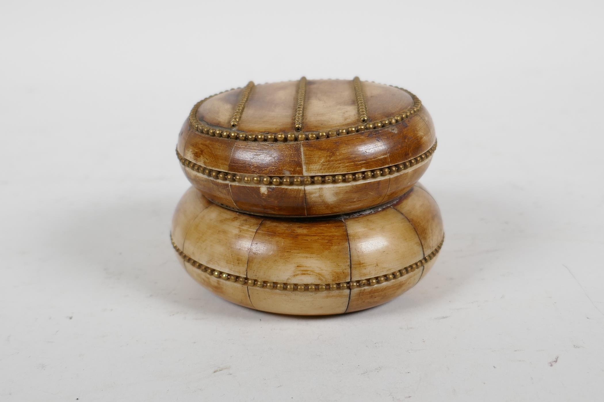A sectional bone box and cover with brass beaded details, 3" diameter - Image 2 of 4