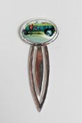 A sterling silver bookmark set with a cold enamel plaque depicting a racing car, 2"