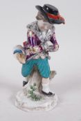 A Continental porcelain figure of a boy skater with a swag of game on his belt, anchor mark to base,