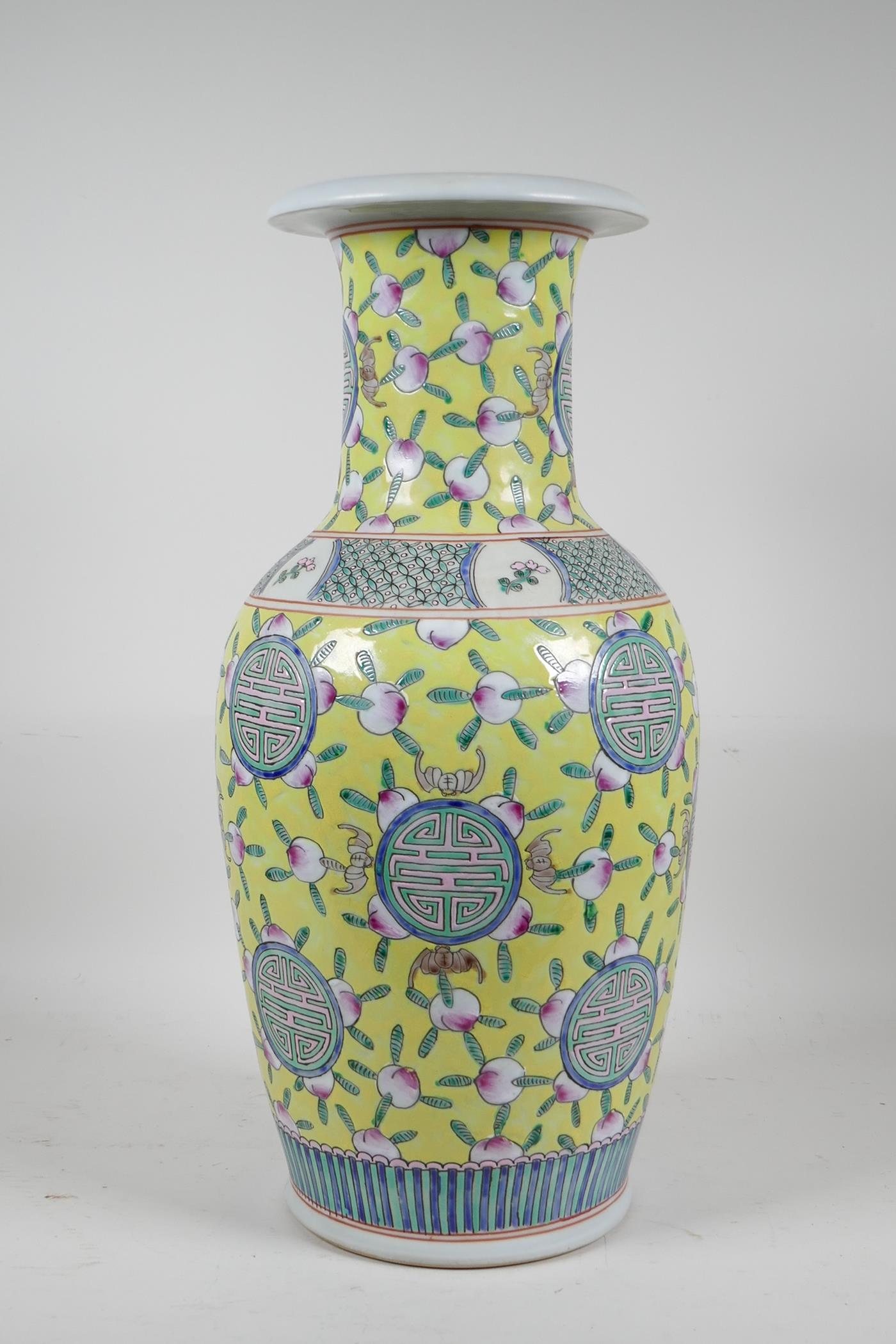 A Chinese yellow ground porcelain vase decorated with auspicious symbols, bats and peaches, 6 - Image 3 of 5