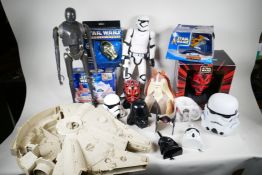 A collection of Star Wars toys and ephemera including K-2SO and First Order storm trooper figures,