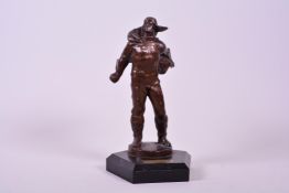 A 1960s Russian solid bronze sculpture of a Soviet space pilot, a 'Stratonaut', with flying helmet