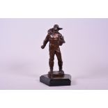 A 1960s Russian solid bronze sculpture of a Soviet space pilot, a 'Stratonaut', with flying helmet