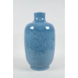 A Chinese blue glazed porcelain vase with underglaze floral decoration, seal mark to base, 11" high