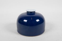 A Chinese powder blue glazed porcelain ink pot, 6 character mark to base, 4" diameter