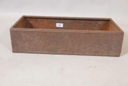 An antique iron trough, 9" x 20" x 5"