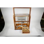 A good set of chemist's scales and weights by Towers of Widnes, together with a cased set of