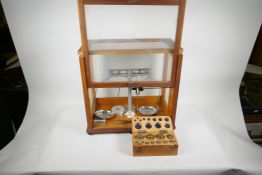 A good set of chemist's scales and weights by Towers of Widnes, together with a cased set of