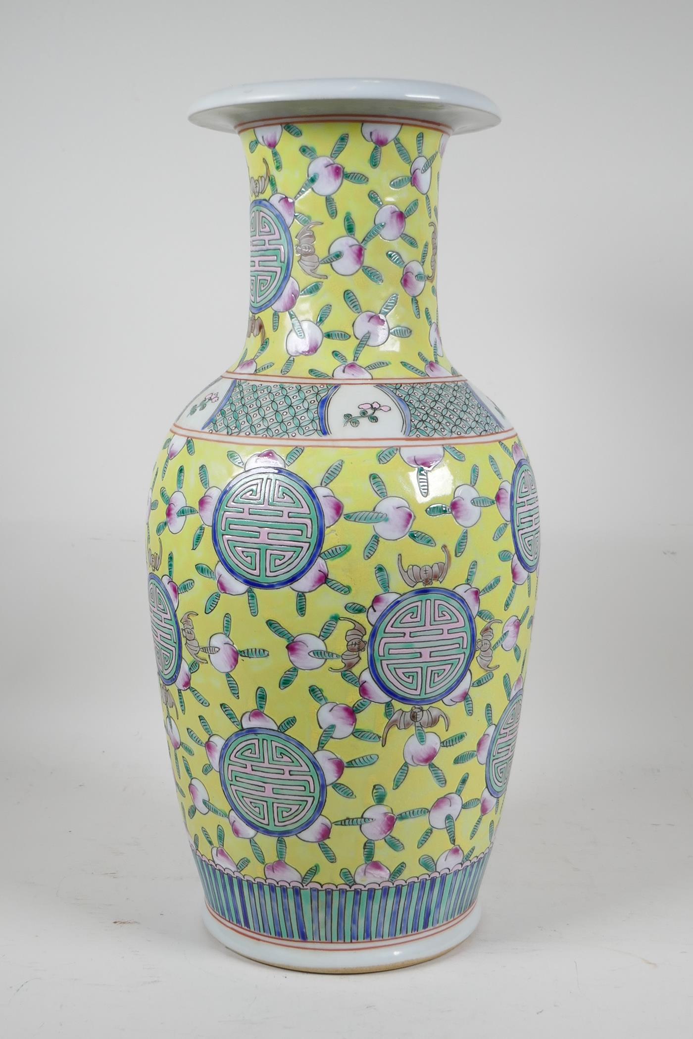 A Chinese yellow ground porcelain vase decorated with auspicious symbols, bats and peaches, 6 - Image 4 of 5