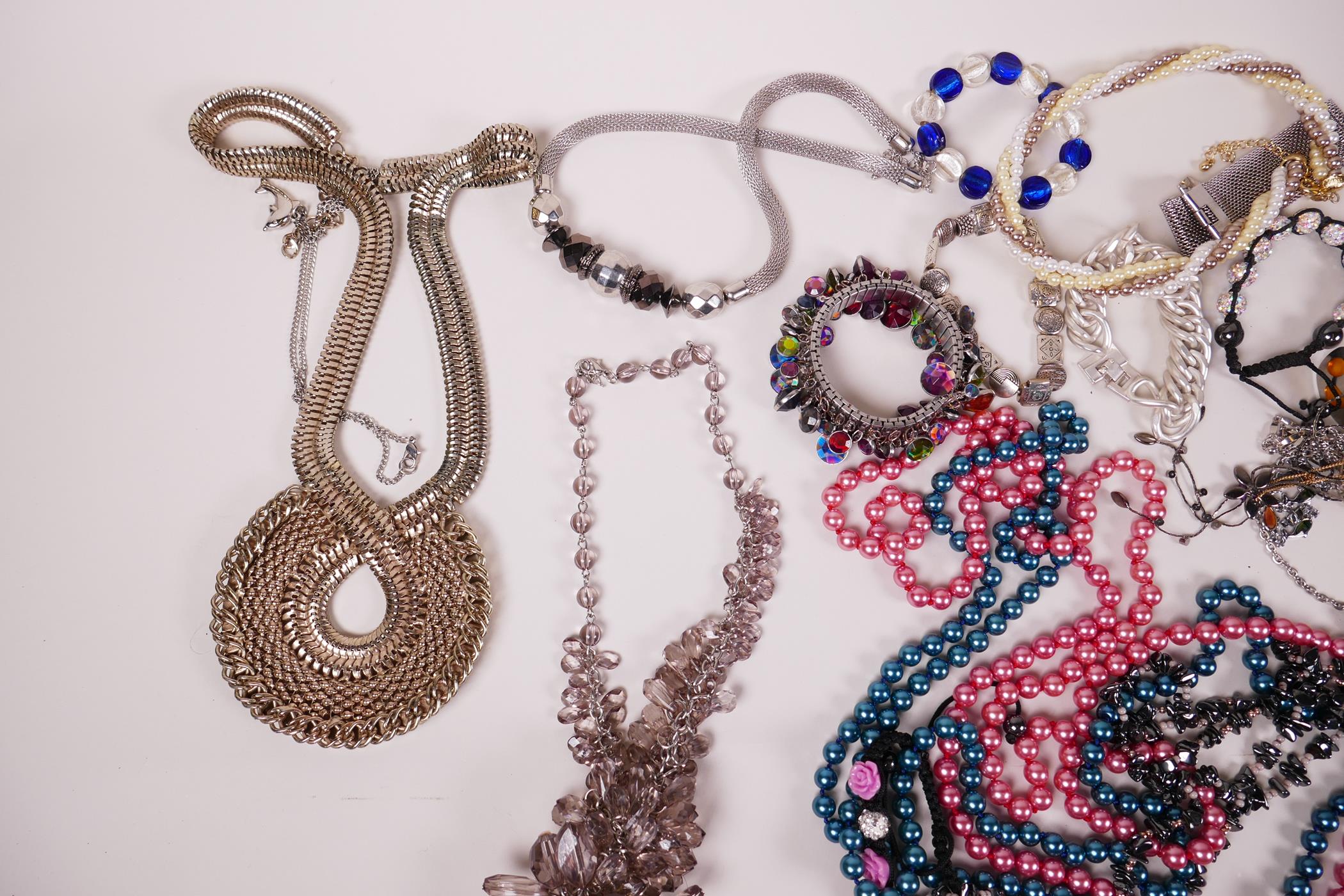 A quantity of costume jewellery, bead necklaces, bangles etc - Image 2 of 3