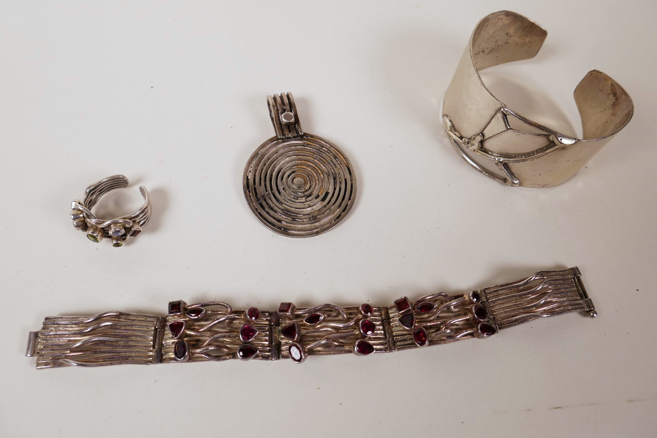 A silver pendant, 1½" diameter, a gatelink bracelet set with amethysts, a ring set with semi- - Image 2 of 5