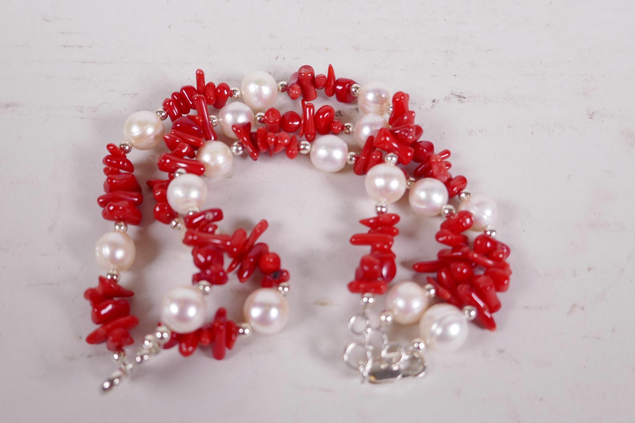 A coral and pearl three strand bracelet, 7½" long