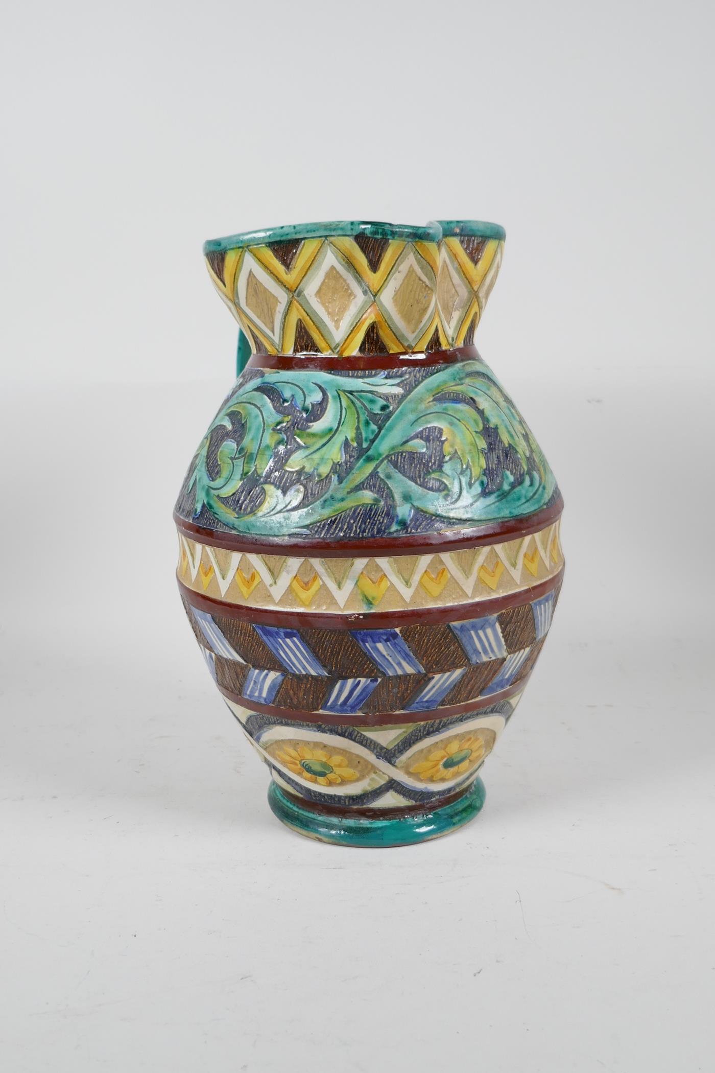 A majolica water jug with scrolling leaf and sunflower decoration, 10" high - Image 2 of 5