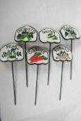 A set of six painted cast metal vegetable markers, 4¼" x 4", courgette, beans, carrot, potato,